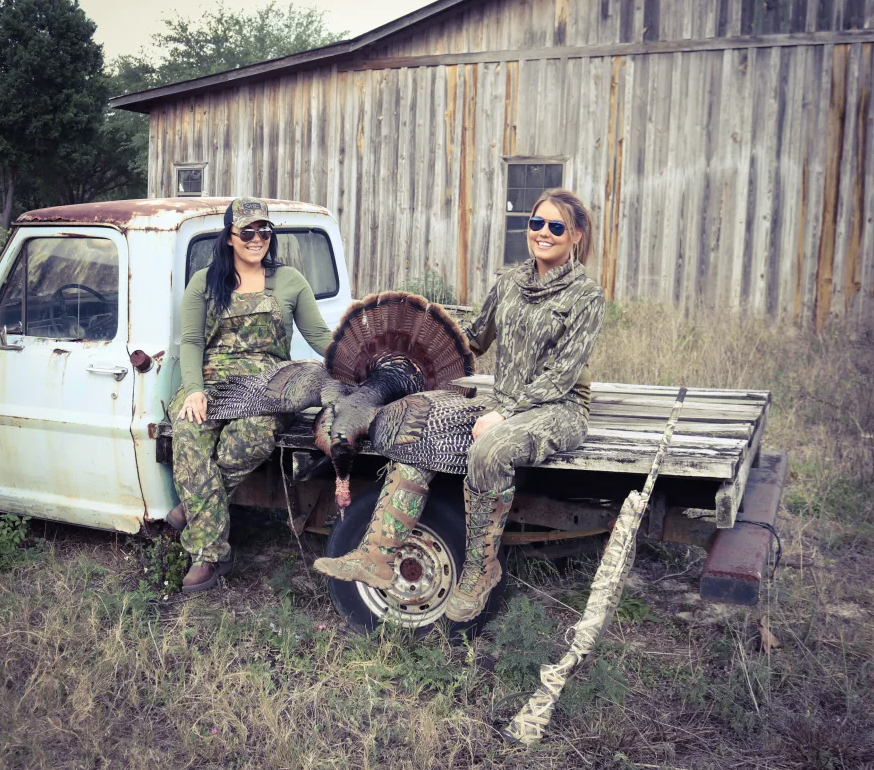Osceola turkey hunters shown with turkey in Florida.
