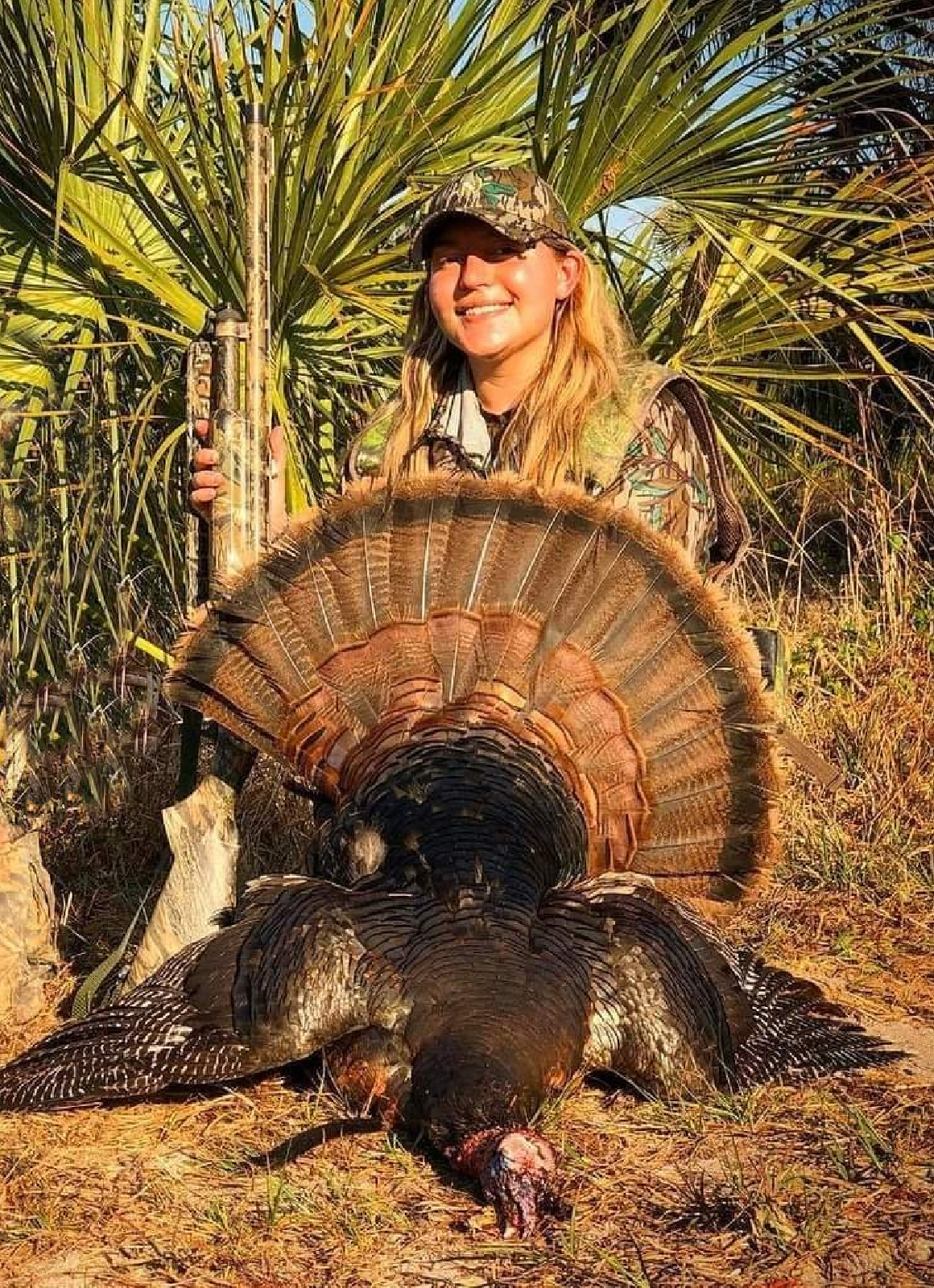 Hunter in Palm Beach, Florida shown with an Osceola turkey.