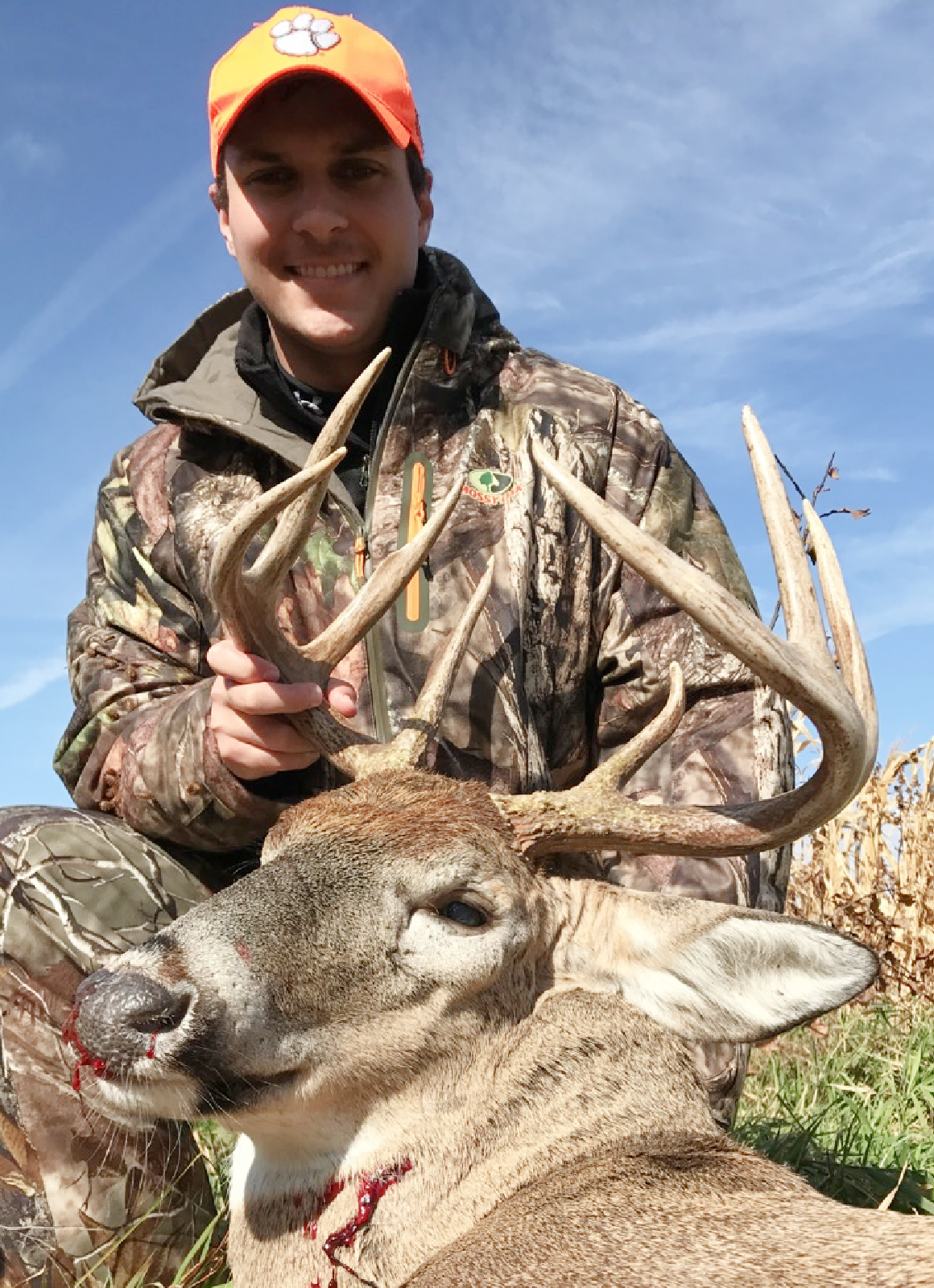 Bow hunter shown with turkey after a successful Spring turkey hunt in the Pacific Northwest, either Idaho or Washington state.
