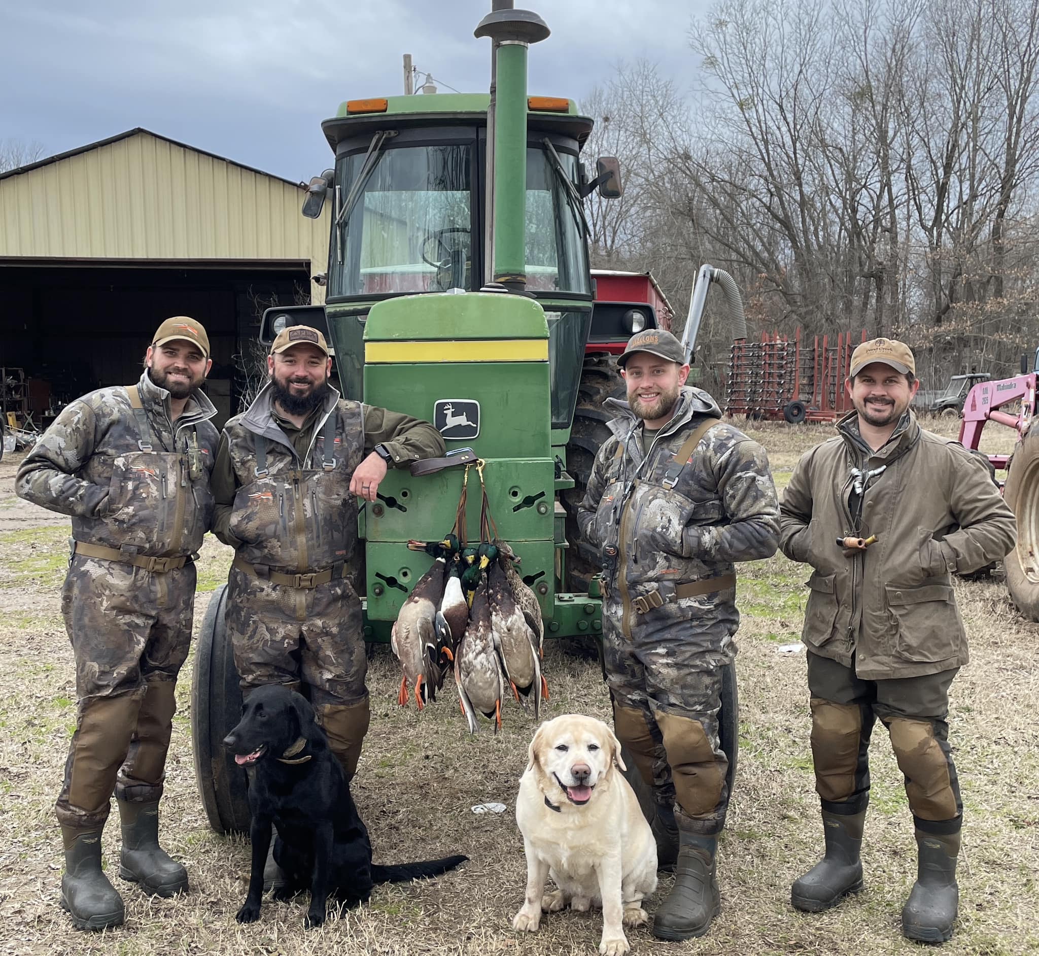Osceola hunters in Florida with hunting guide, shown with two successful harvests. 