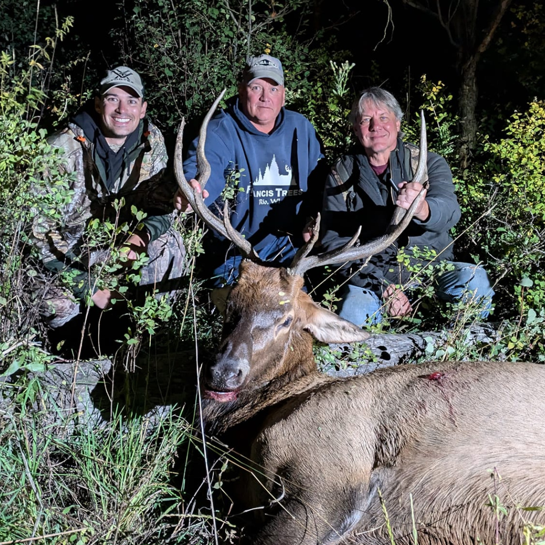 Bow hunter shown with turkey after a successful Spring turkey hunt in the Pacific Northwest, either Idaho or Washington state.
