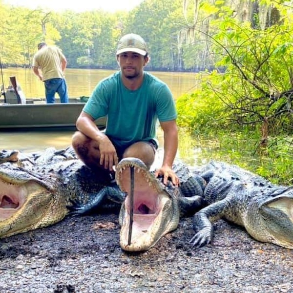 Hunter shown with turkey in Texas during a Spring Texas Turkey Hunt.